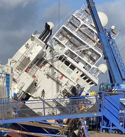 Ship righted and afloat after toppling in Leith dry dock