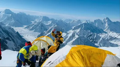 Noel Hanna at a campsite on the slops of K2