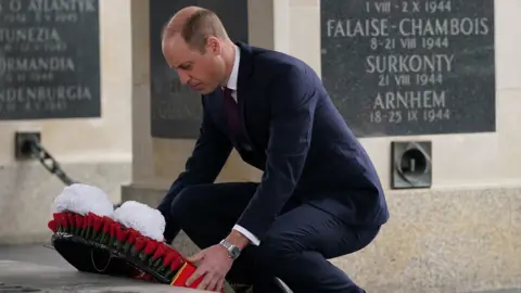 PA Media Prince William laying a wreath