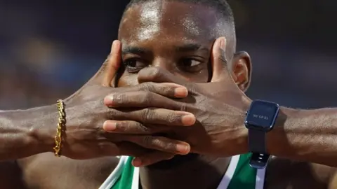 Reuters Cameroon's Emmanuel Eseme celebrates after winning the men's 100m at the Prince Moulay Abdellah Sports Complex, Rabat, Morocco - May 19, 2024