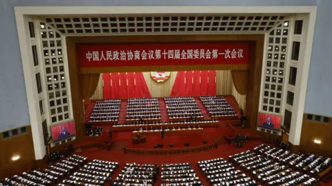 EPA Delegates attend the opening session of the Chinese People's Political Consultative Conference (CPPCC) at the Great Hall of the People, in Beijing, China, 04 March 2023.