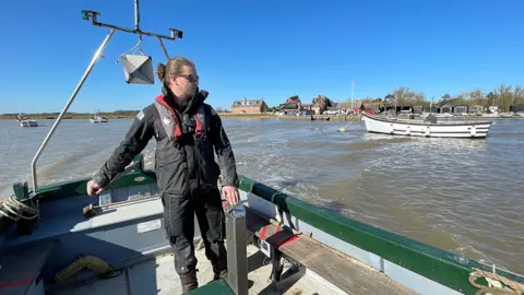 Mike Liggins/BBC Orford Ness boat supervisor Guy Brown