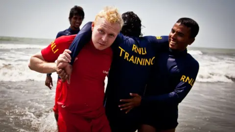 RNLI/Mike Lavis Darren teaching lifesaving skills in Bangladesh