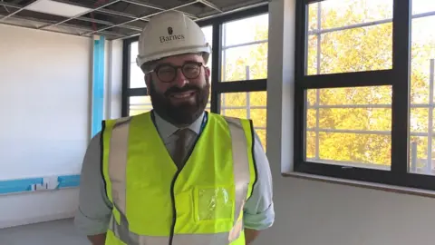 Jon Wright/BBC Dr Paul Driscoll-Evans