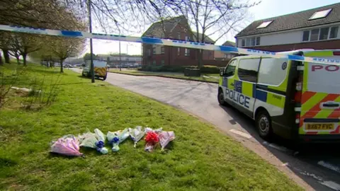 BBC Floral tributes left at the scene