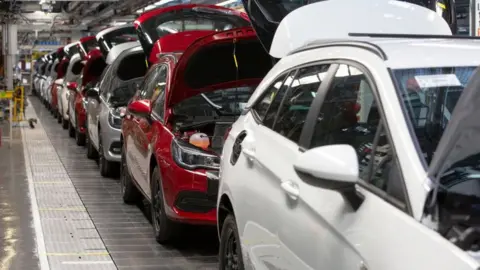 Getty Images Vauxhall cars on production line at Ellesmere Port.