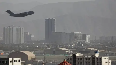 Getty Images A plane taking off from Kabul airport