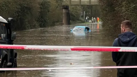 @radiojagger A car is submerged in flood water on the B4265 in Llantwit Major