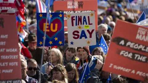 EPA Anti-Brexit campaigners march in Liverpool during the Labour conference