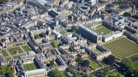 Getty Images High level oblique aerial view south-east of Cambridge including River Cam, historic University colleges and 'the backs' in summer Cambridgeshire