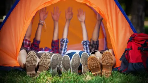 Getty Images Kids in tent