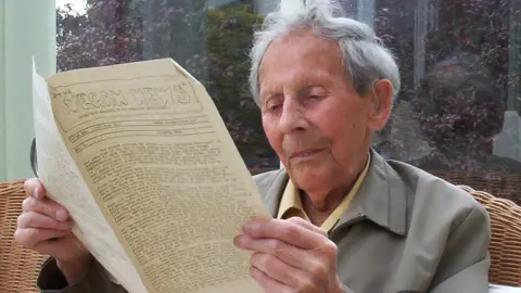 The Vegan Society Donald Watson reading a copy of Vegan News