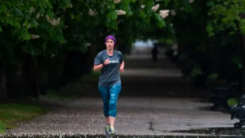 Getty Images Jogger running along