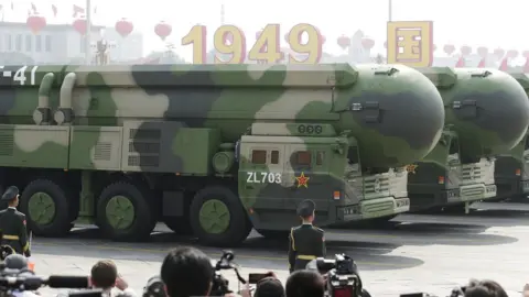 Reuters Military vehicles carrying DF-41 intercontinental ballistic missiles