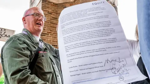 Equity An Equity spokesperson with a petition