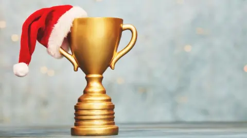 CatLane Trophy with a Christmas hat on