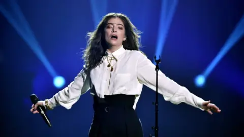 Getty Images Lorde performing