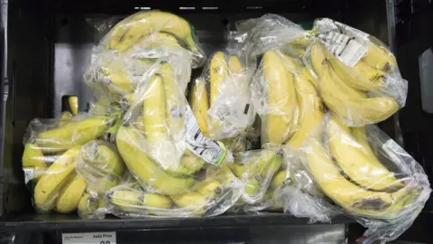 AFP/Getty Bananas covered in plastic