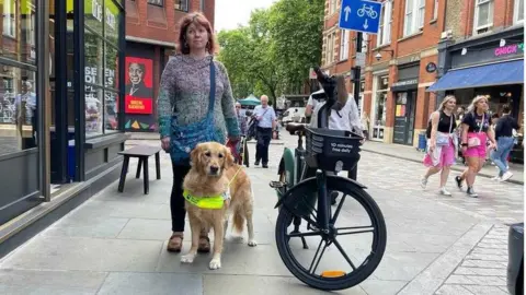 Sarah Gayton Miss Leadbetter and guide dog Nellie