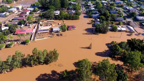 Getty Images An aerial view of flooding in a suburb in Brisbane