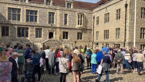 The crowd waiting for the proclamation service in Winchester