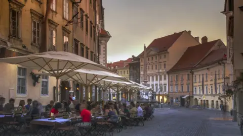 Getty Images/Buena Vista Images Outdoor restaurant in Ljubljana