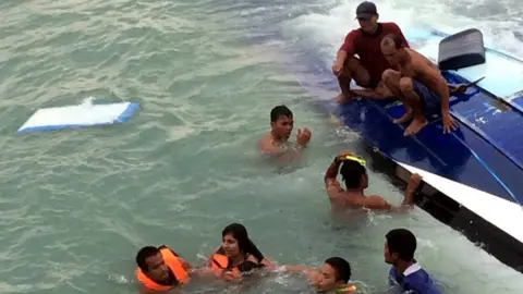 EPA People being pulled from the sea