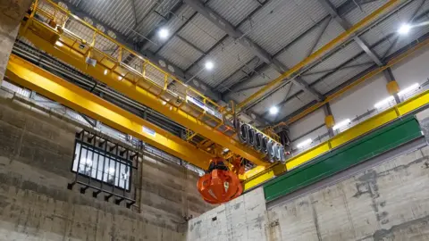 Rob Johns The inside of the Rookery South Energy Recovery Facility, showing the grabber that picks up the waste