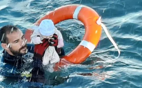 Guardia Civil Spain's Guardia Civil posted pictures of a baby and toddlers being rescued from the sea off Ceuta
