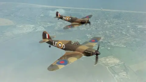 Getty Images A Hawker Hurricane IIc LF363 (foreround), and a Supermarine Spitfire IIa P7350