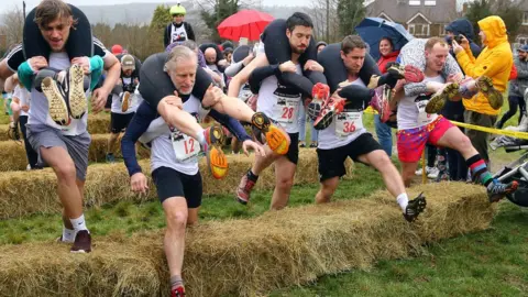 PA UK Wife Carrying Race at The Nower in Dorking