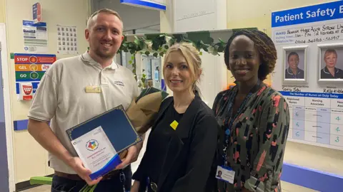 Richard Lee Richard Lee with two hospital colleagues