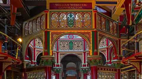 Getty Images The interior of highly decorated Victorian pumping station with painted and intricate iron works. 