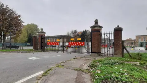 The closed gates outside the Scampton site. 