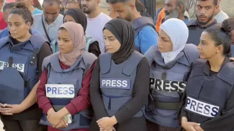 vigil for al jazeera journalist in Gaza