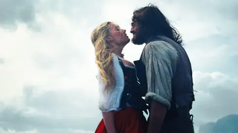 Warner Bros Robbie as Cathy and Elordi as Heathcliff on the Yorkshire Moors