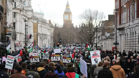 Getty Images Protesters march along Whitehall during a national march for Palestine on January 31, 2026 in London