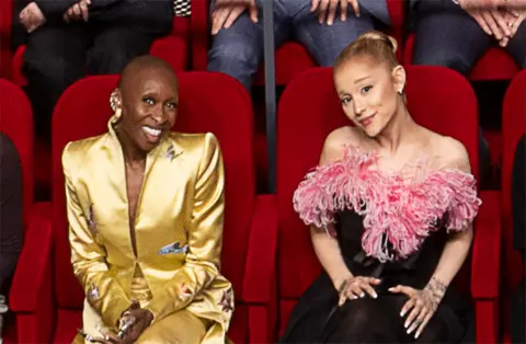 AMPAS Cynthia Erivo and Ariana Grande in the 97th Oscars nominees dinner class photo