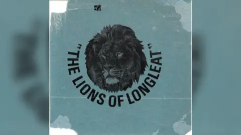 Longleat A blue bumper sticker that says "The Lions Of Longleat" with a lion's face on the front