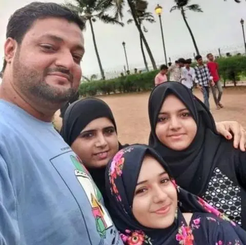 BBC Dokadia family in happier times - Abdullah and wife Nasreen with their two daughters Ayesha and Zainab