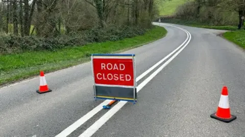 Road closed sign