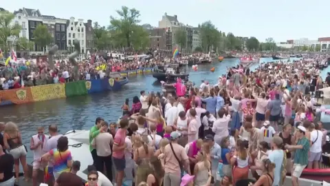 Colourful crowds flocked to the iconic Pride boat canal 