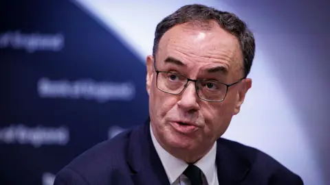 EPA A head and shoulders shot of Bank of England governer Andrew Bailey looking away from camera as he speaks at a press conference in London on 7 November