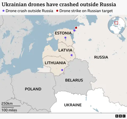 Alt text: Map showing the Baltic region and parts of eastern Europe. Countries labelled include Estonia, Latvia, Lithuania, Belarus, Russia, Poland, and Ukraine. Purple dots mark reported drone crash sites outside Russia in Estonia, Latvia, and Lithuania, while a red dot near the Estonia–Russia border indicates a drone strike on a Russian target. An inset map highlights the region’s location within Europe.