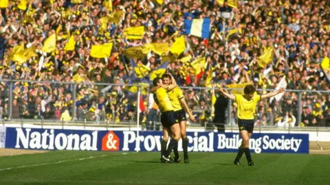 David Cannon/Allsport Oxford players celebrate the goal scored by Jeremy Charles during the Milk Cup Final against Queens Park Rangers at Wembley Stadium in London. 