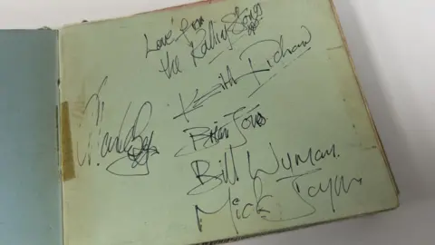 Richard Winterton Auctioneers A collection of signatures from members of the Rolling Stones.