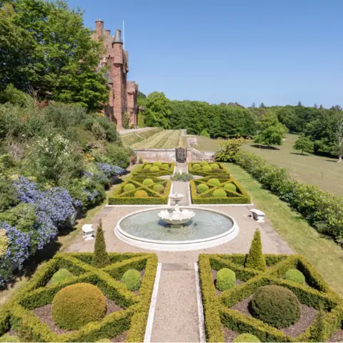 Knight Frank A very neatly designed garden with fountain
