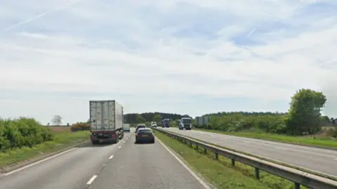 Google Blyth Road with vehicles either side
