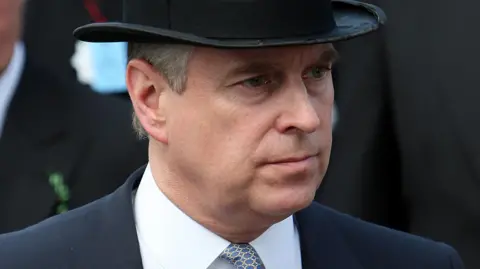 Prince Andrew in a top hat at Ascot in 2011