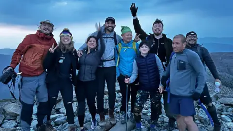 PA Media Karolina Pakenaite with the rest of the group